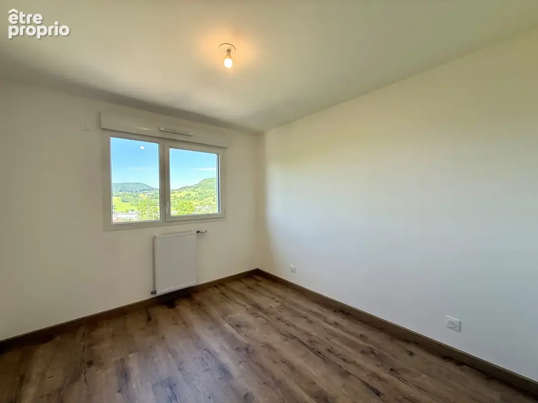 À vendre – Appartement T4 traversant de 95 m² à Ambilly (74) - photo 3