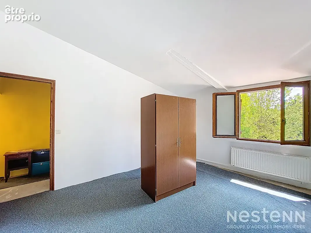 A Vendre Maison de ville en pierre de 123 m² habitable de plain-pied à proximité immédiate des commodités - photo 10