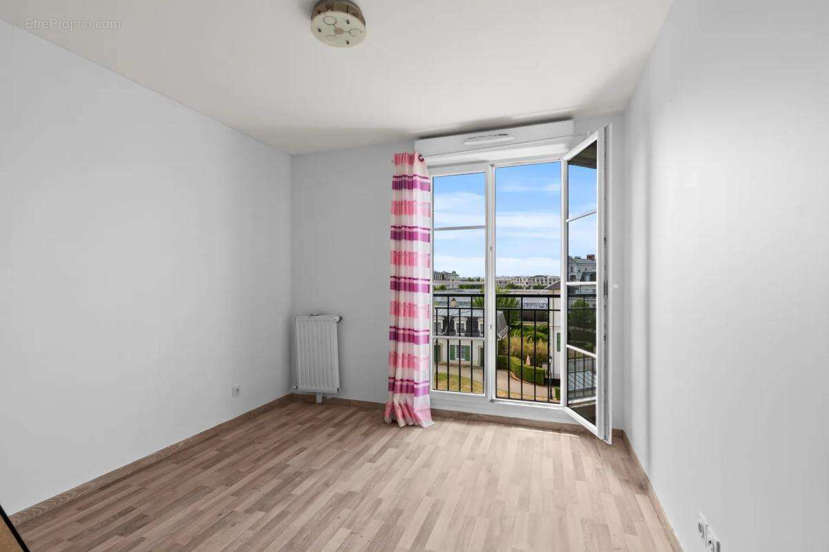 Appartement 3 pièces de 57 m² à Serris - photo 9