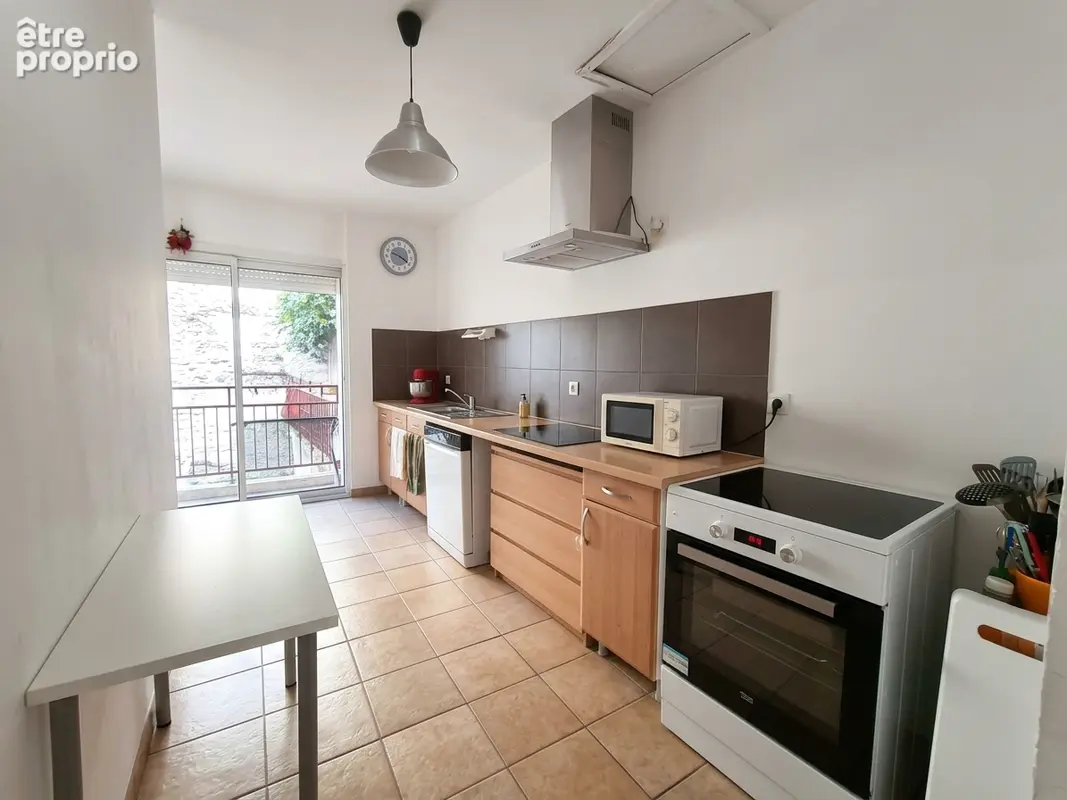 Appartement 4 pièces 89 m² à vendre à Nimes (30000) - photo 3