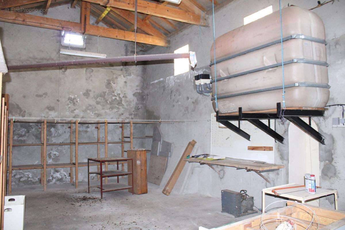 Maison avec local commercial et double garage de 66 m² - photo 12