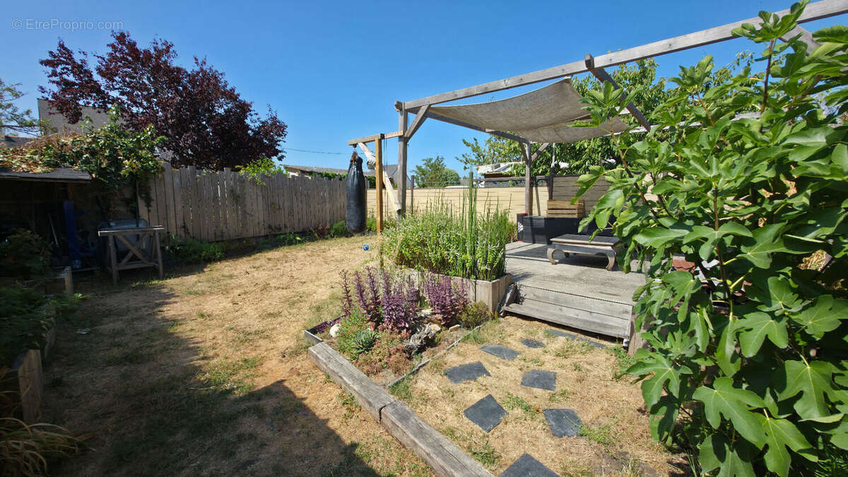 Charmante petite maison rénovée d'environ 50m² avec jardin et stationnement secteur Pont de Paille à Trignac - photo 14