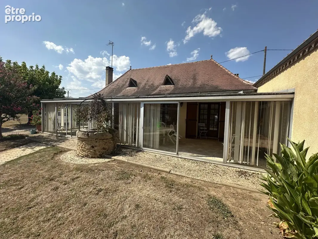 Maison de 196 m² avec double garage et atelier - photo 4