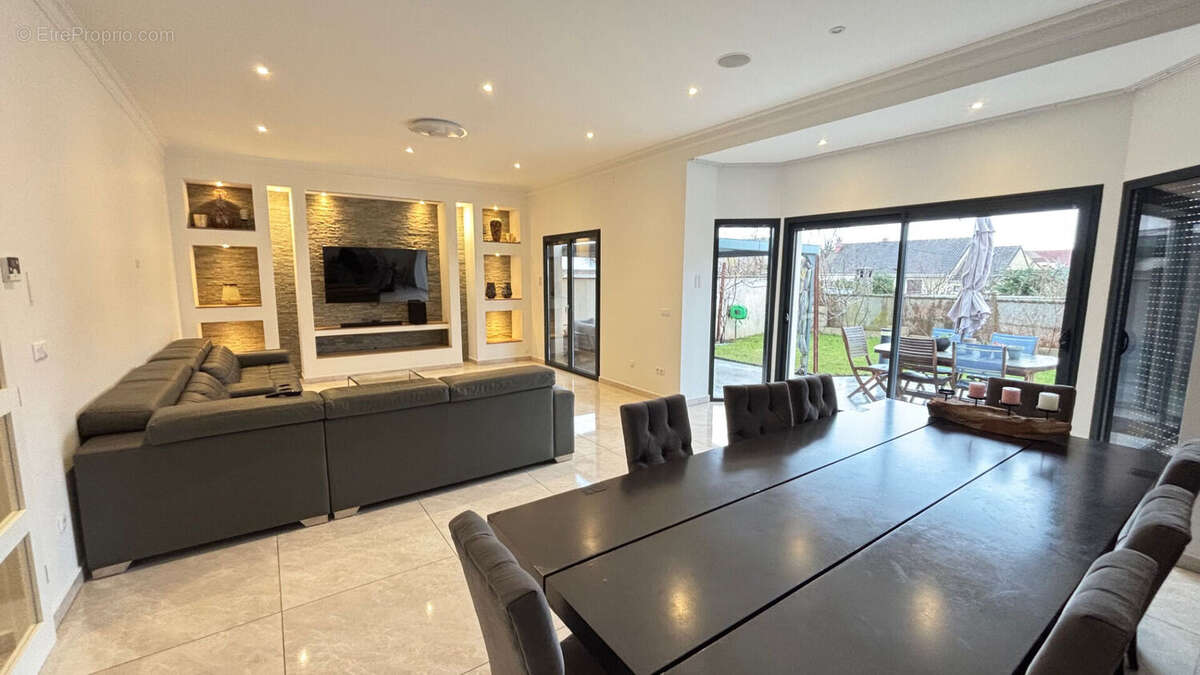 Maison à AUBERGENVILLE