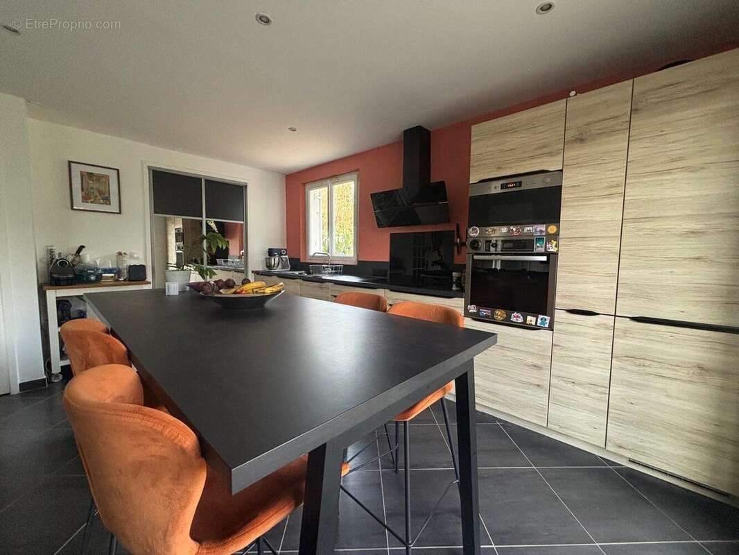Maison 91 m² à Saint-Germain-Les-Corbeil  - photo 3