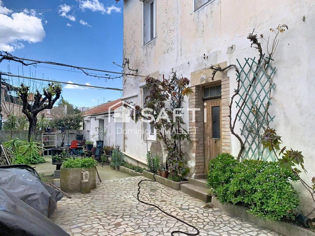 Photo 1 - Maison à NIMES