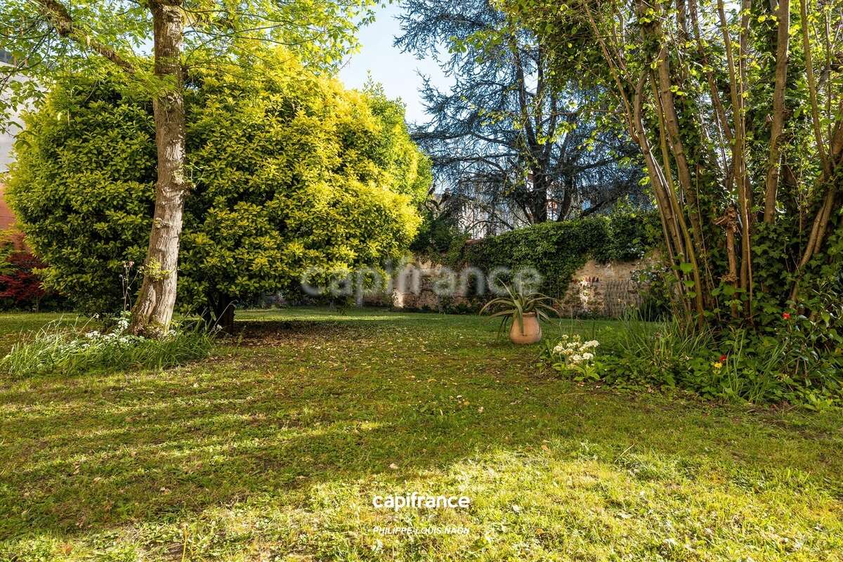 Appartement de style haussmannien d'exception avec grande pièce à vivre de plus de 70m2 - photo 8
