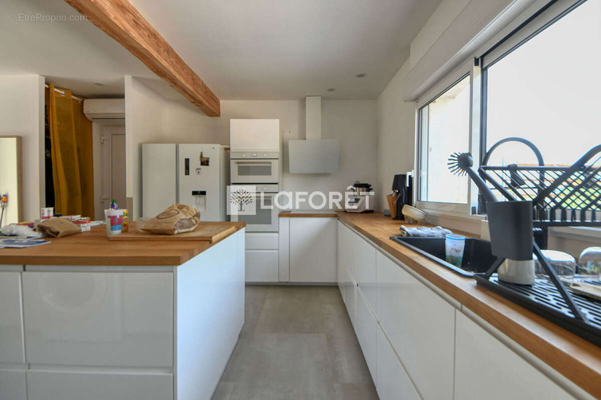 Propriété de 191 m² avec deux habitations indépendantes, piscine et hangar de 140 m² à vendre à Montans - photo 10