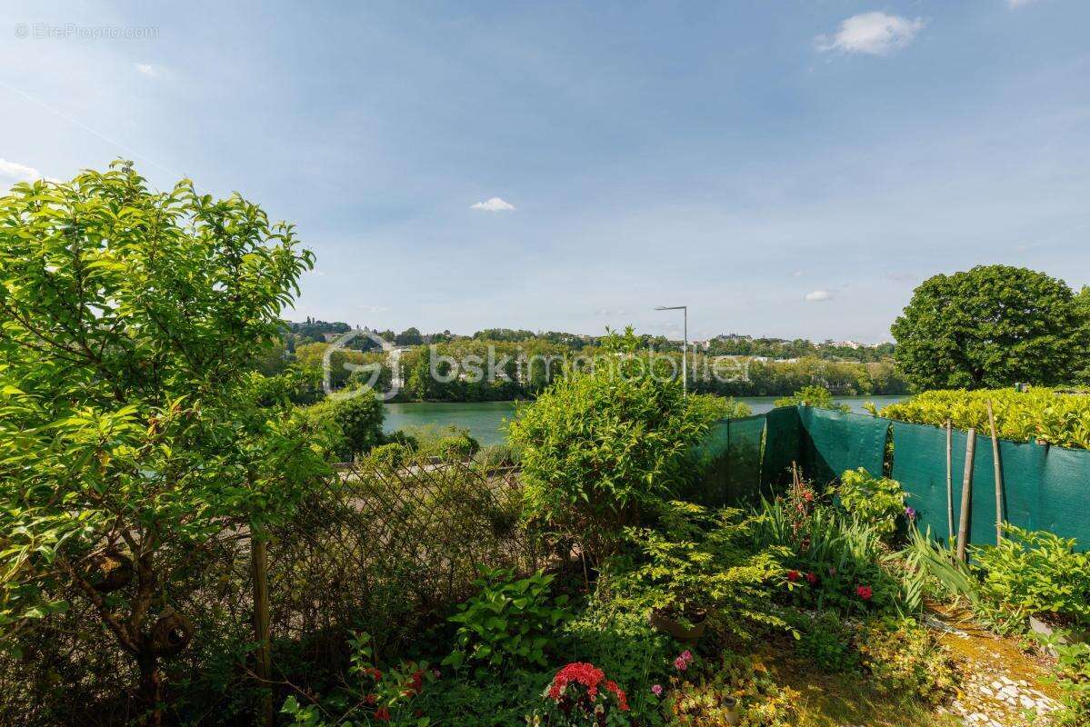 Charmant T3 de 58 m² + 2 terrasses arborées situé en bord de Saône, au sein d'une résidence boisée - photo 14