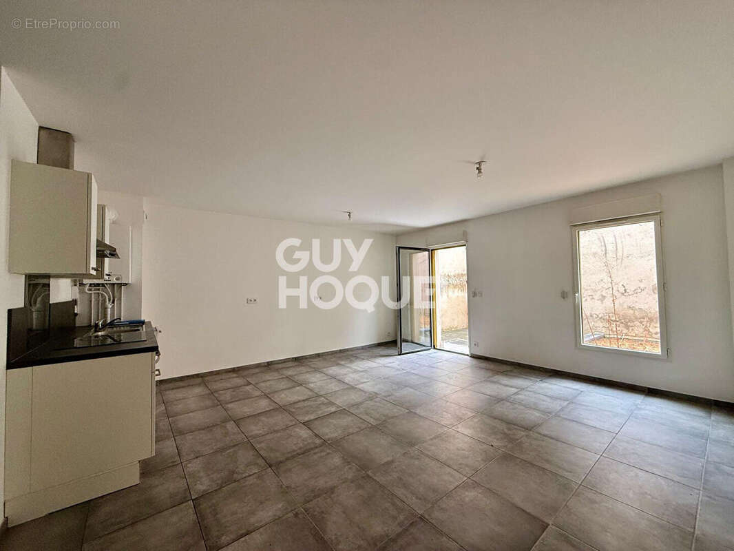 T4 avec jardin et terrasse privatifs de 38m² - CALUIRE BOURG - photo 3