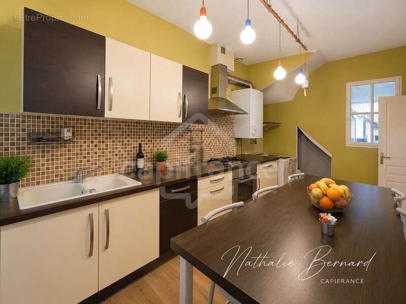 Immeuble mixte avec local commercial et habitation – Centre-ville de Villeneuve-sur-Lot - photo 9