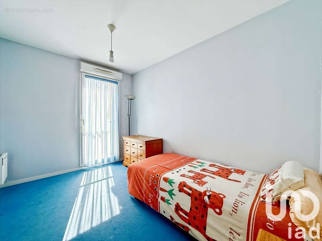 Photo 6 - Appartement à SAINTE-GENEVIEVE-DES-BOIS