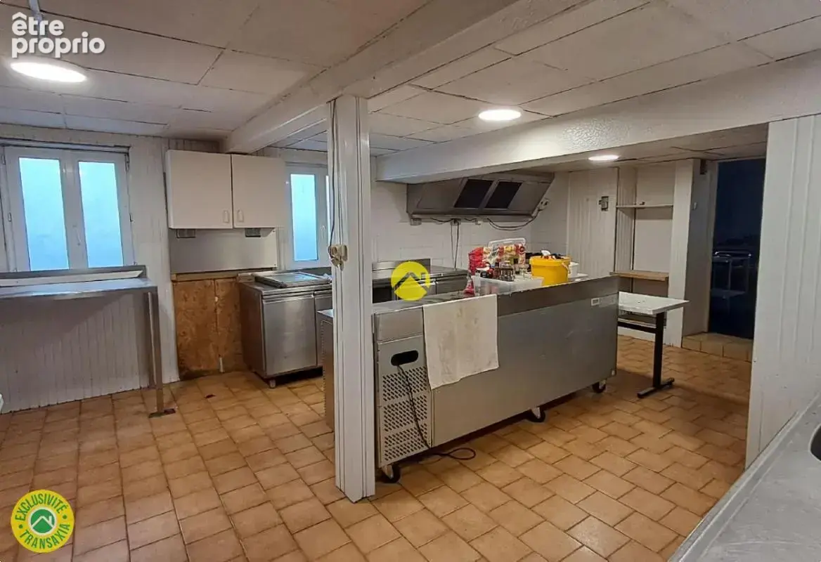 Appartement + commerce - photo 4
