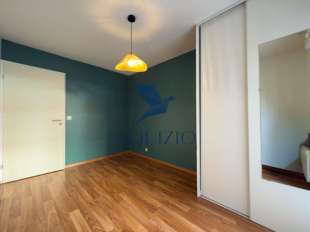 Appartement T3 en rez de jardin avec grande terrasse - photo 9