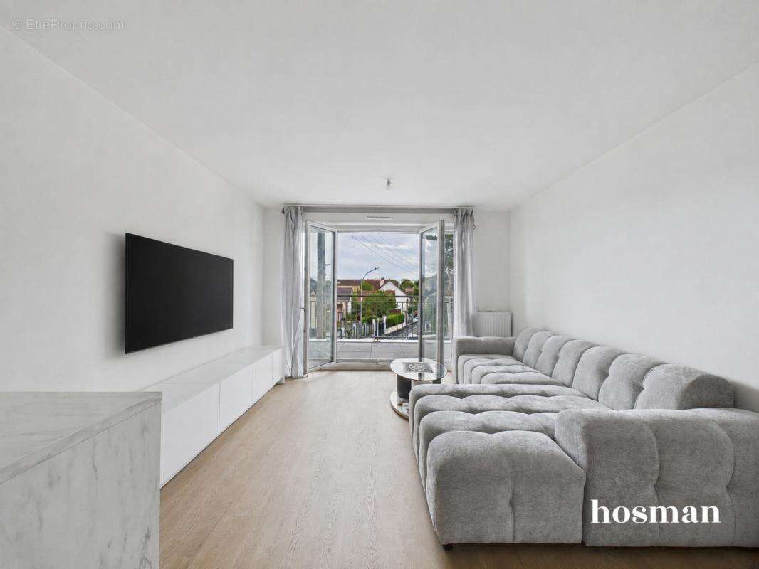 Appartement 3 pièces lumineux avec balcon et parking - Immeuble récent - Proche RER - photo 4