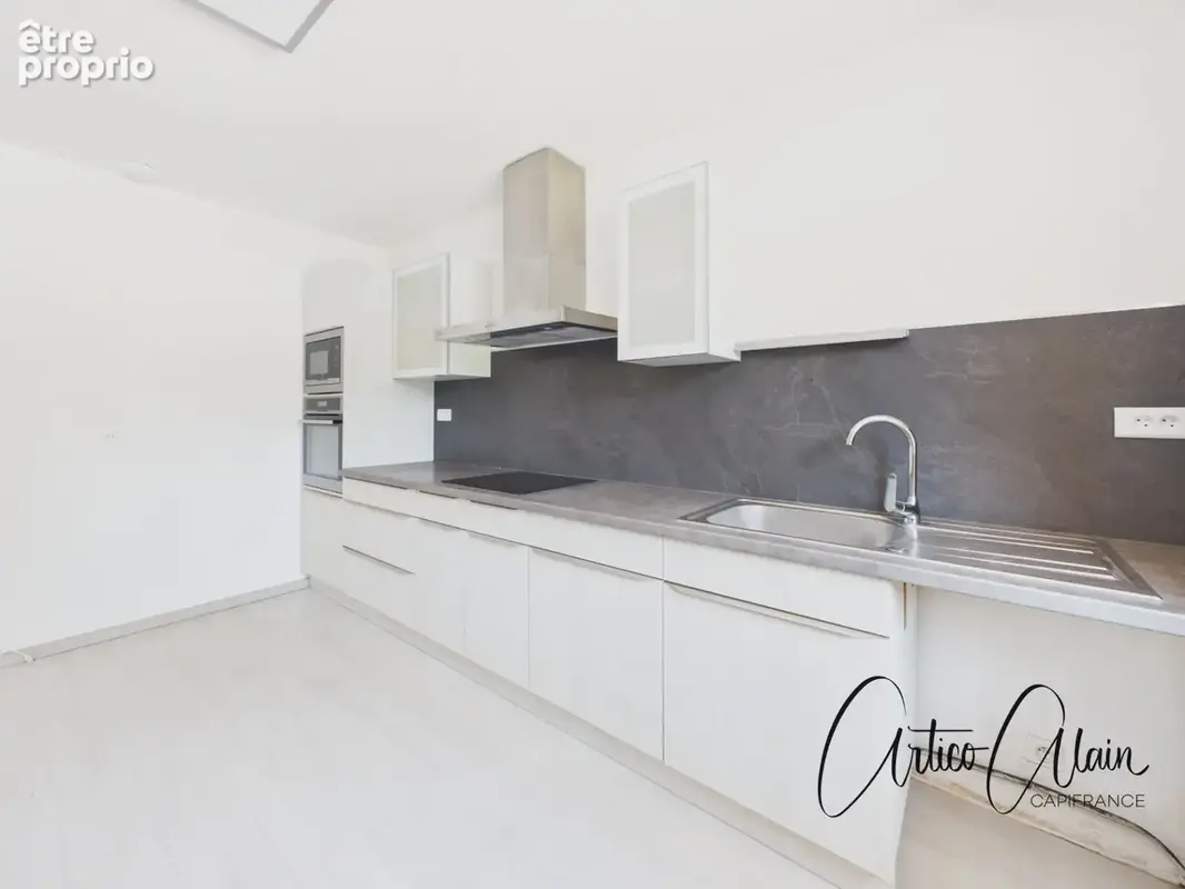 Maison de plain-pied  de 117 m² proche du centre de REVEL – Terrain 1 200 m² - photo 4