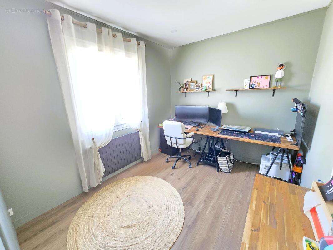 maison de 5 pièces de 124m² - photo 4