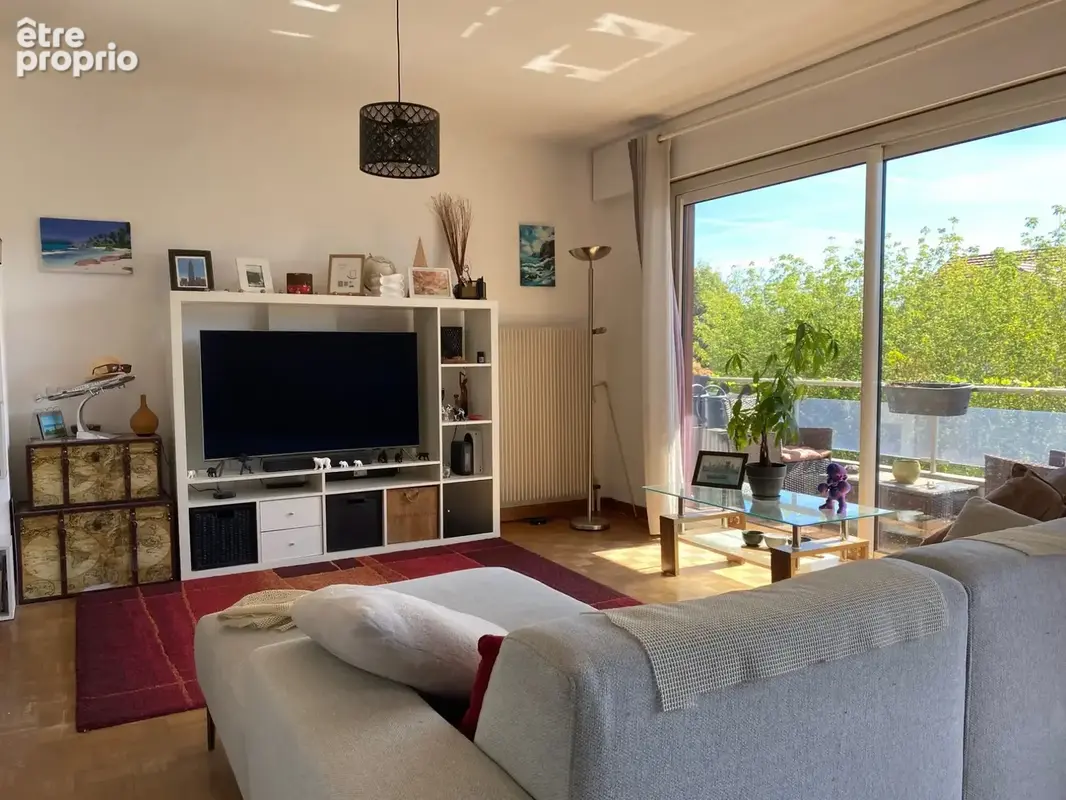 Appartement 4 pièces 90 m² à vendre à Saint-Genis-Pouilly (01630) - photo 4