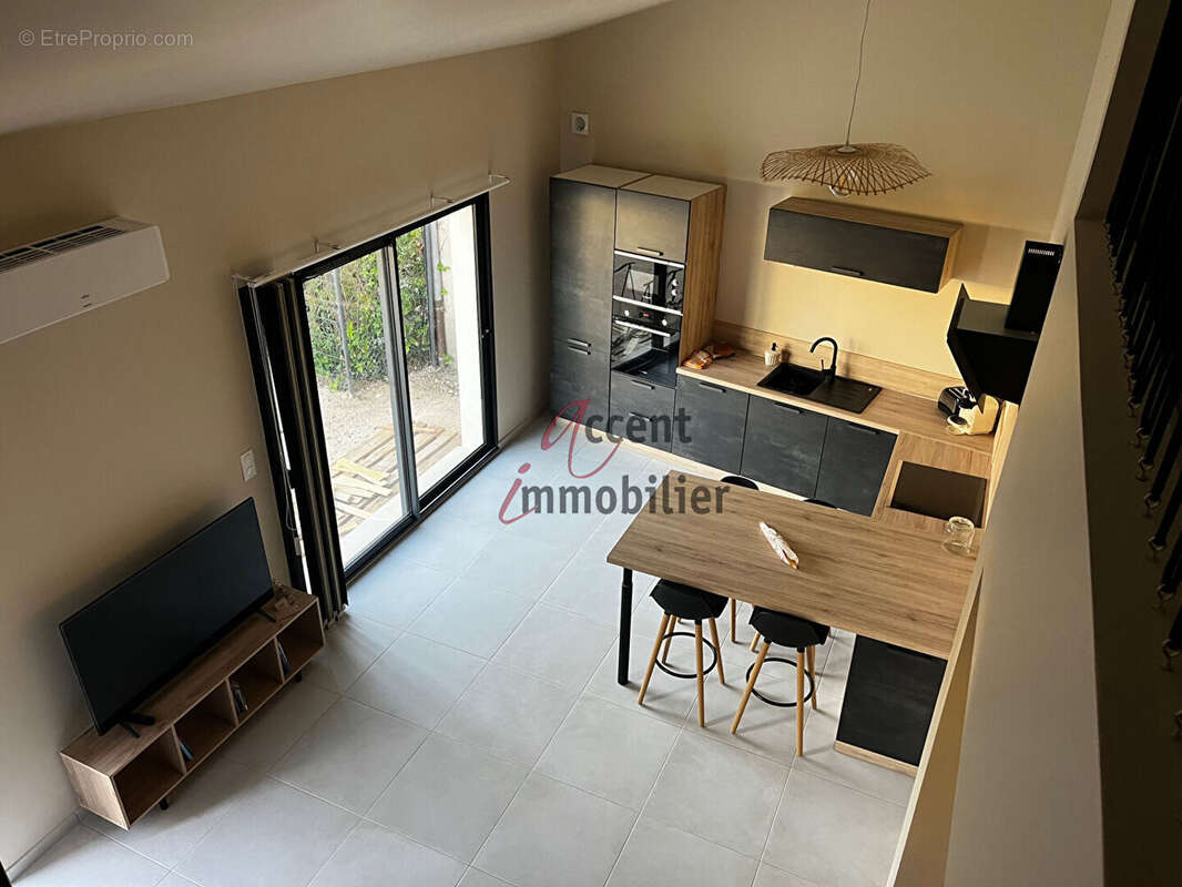 EXCLUSIVITE : Maison plain pied avec jardin T2 Bis (mezzanine) et places de parking - photo 10