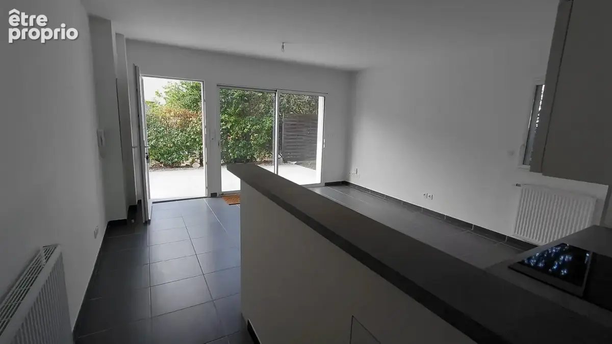 Beau rez de jardin avec garage - photo 3