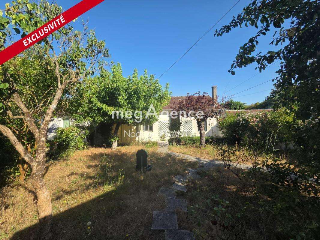 Maison de plain-pied à vendre – Saint-Jean-d'Angély (17400) – Jardin, garage et centre-ville à pied - photo 14