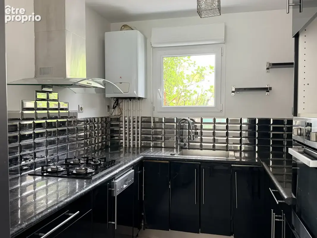 HIDRI IMMO PLUS vous propose en exclusivité une maison avec jardin, terrasses et garage à Saint-Martin-d'Hères - photo 11