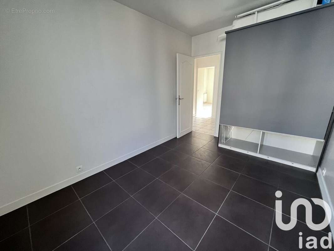 Photo 9 - Appartement à COURBEVOIE