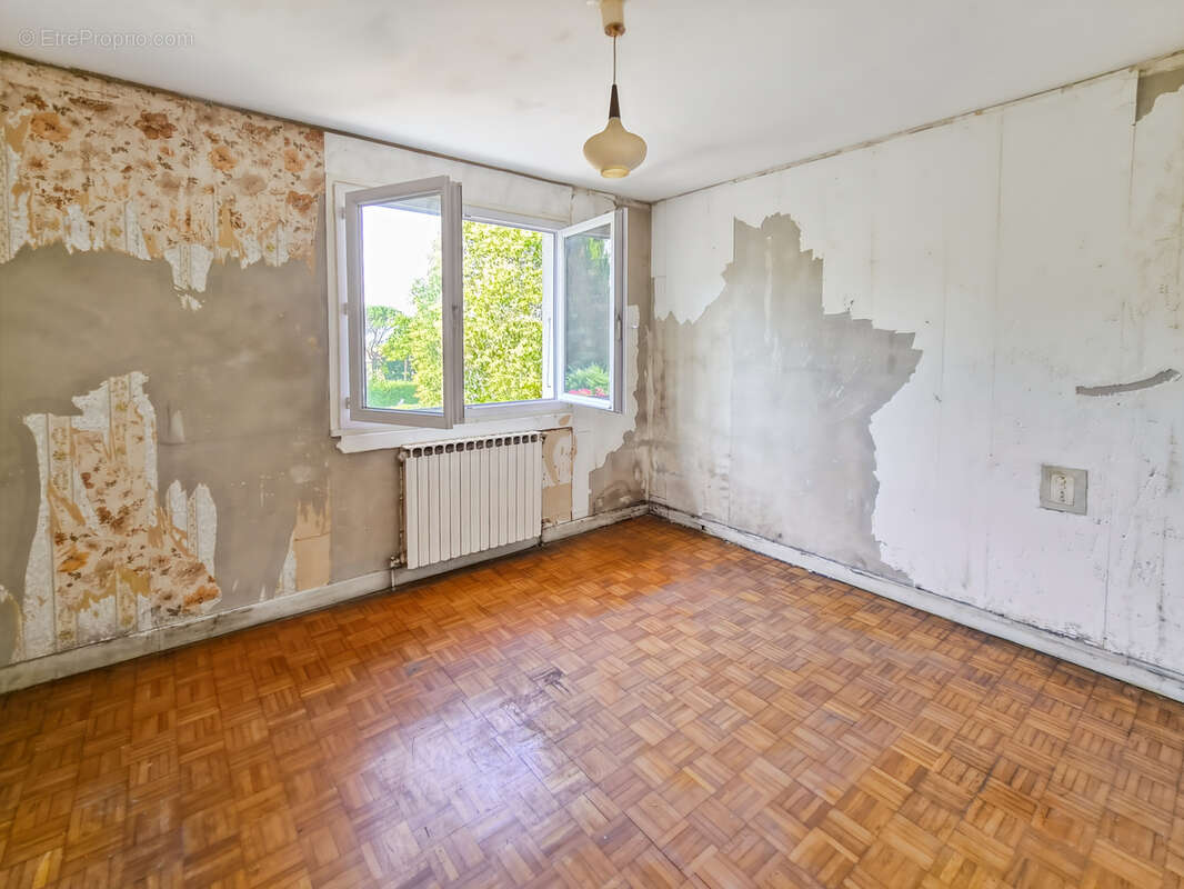 Maison T4 de 105m2 avec garage en sous-sol et jardin - Mauvezin - photo 9