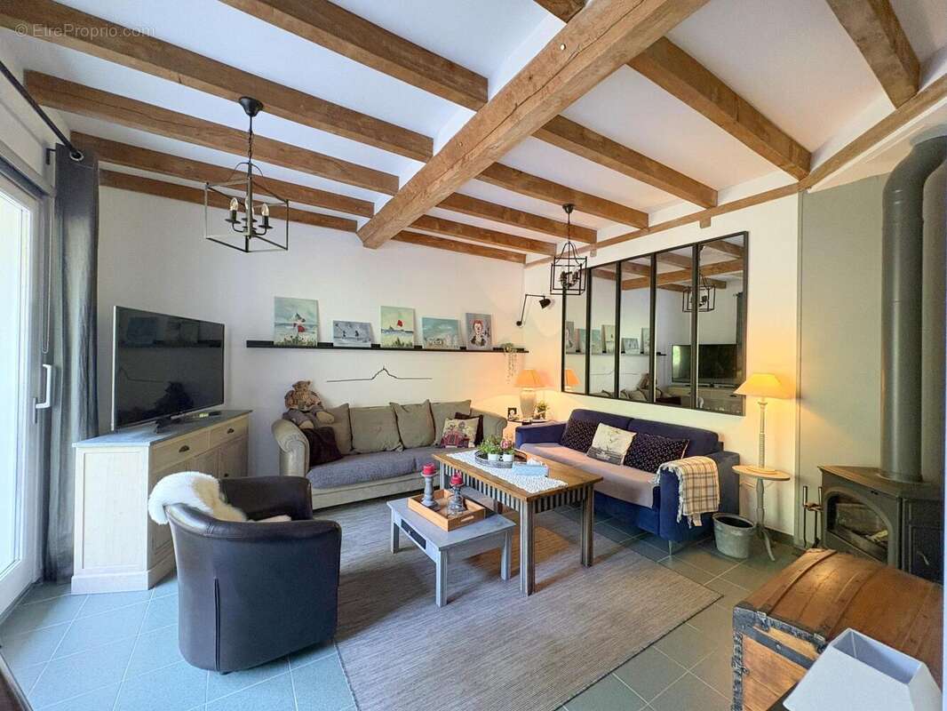 Maison 84 m² à Courtils  - photo 2