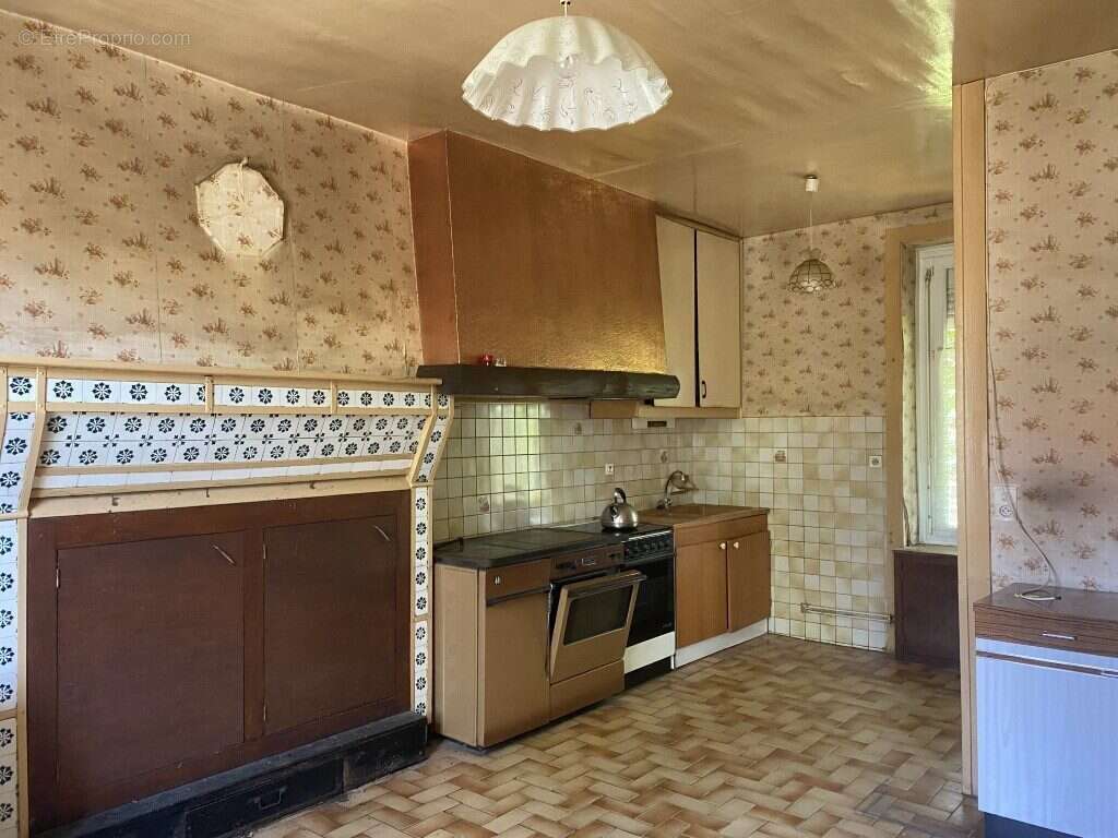 Maison à SAINT-DENIS-DES-MURS