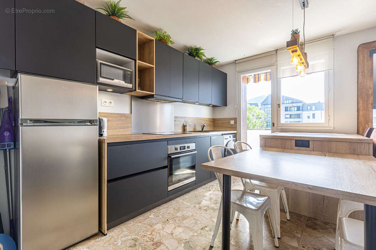 Agence immobiliere laforet - exclusivite - "oeillet" - annecy - appartement t3 de 65.14m² - traversant - 2 balcons - cave - avan - photo 5