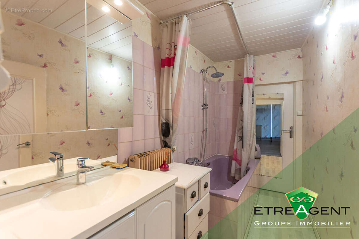 Maison DAMVILLE CENTRE-VILLE - 142 m² - 3 chambres - photo 13