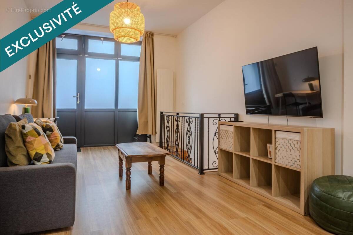 Photo 1 - Commerce à PARIS-18E