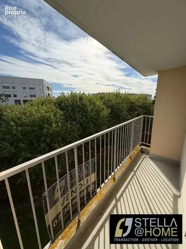 T2 traversant au sein d'une copropriété verdoyante - photo 7