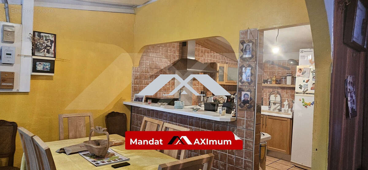 Maison 100 m² à Saint-Denis  - photo 2
