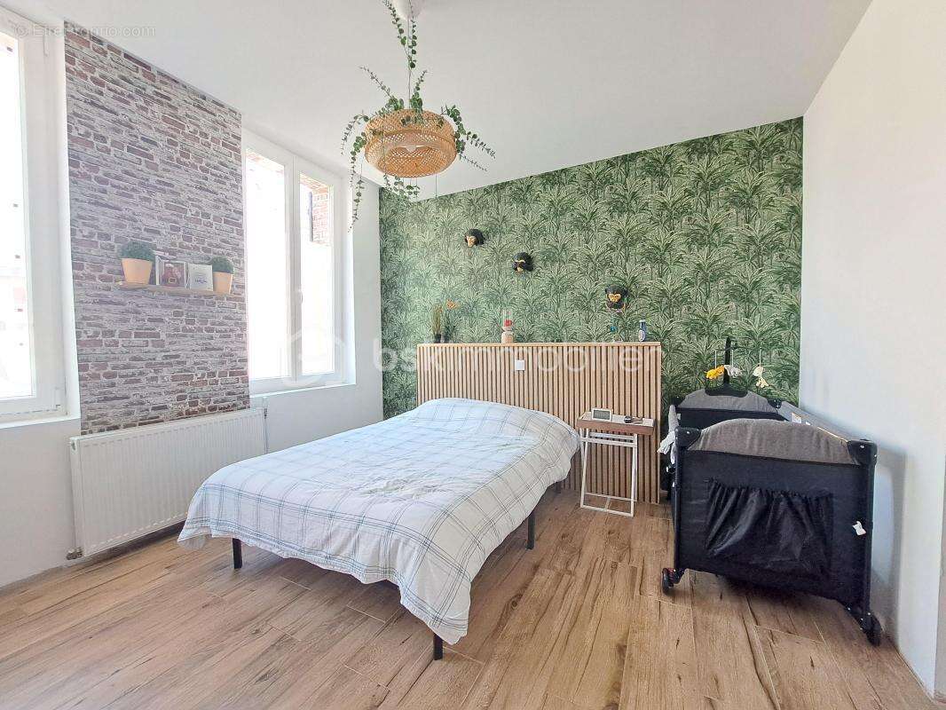 Maison renovee en briques avec entree sous porche et rentabilitee assuree - photo 11