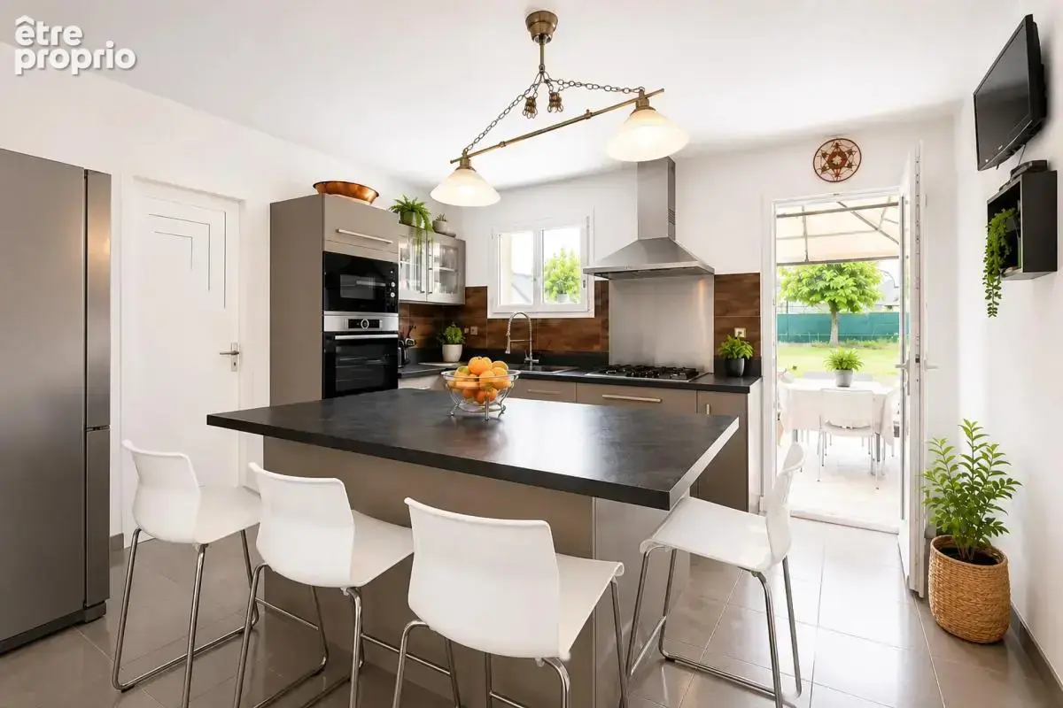 Une maison familiale avec jardin - 122 m² - Monnaie - photo 6