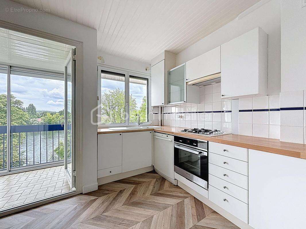 Triel sur Seine  Vue imprenable sur la Seine – Grand 4 pièces avec loggia, parking et fort potentiel - photo 6