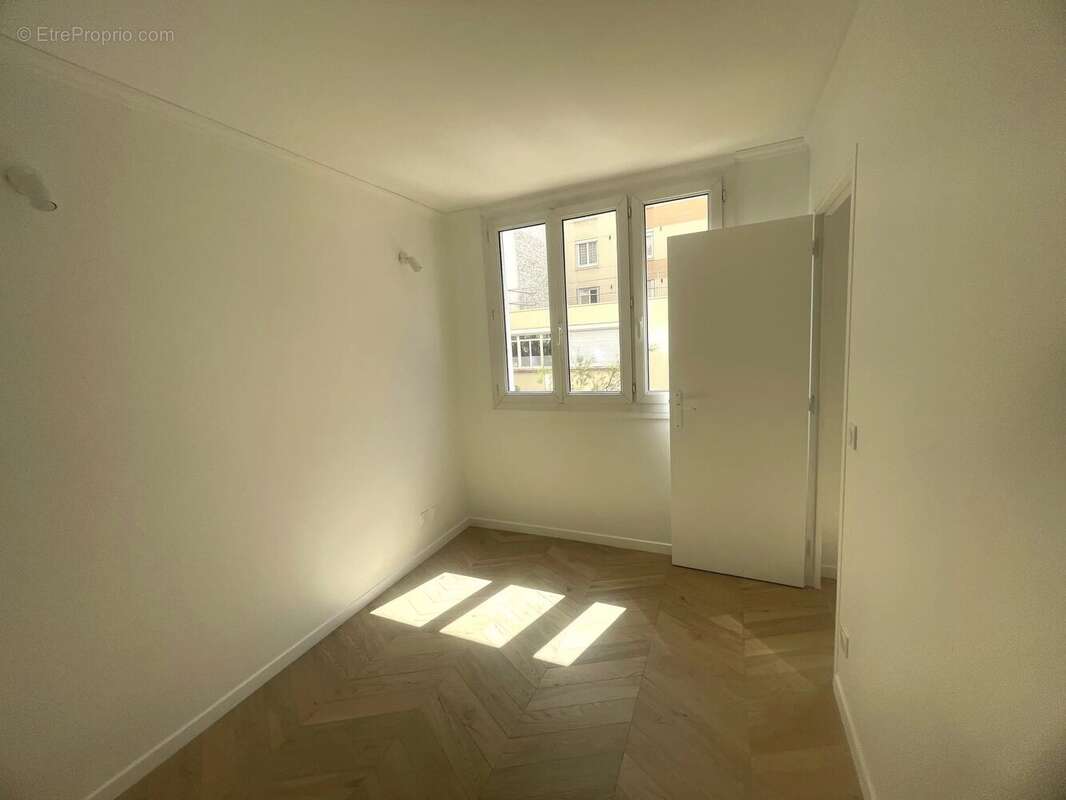 Appartement familial - 4 chambres - refait a neuf - photo 11