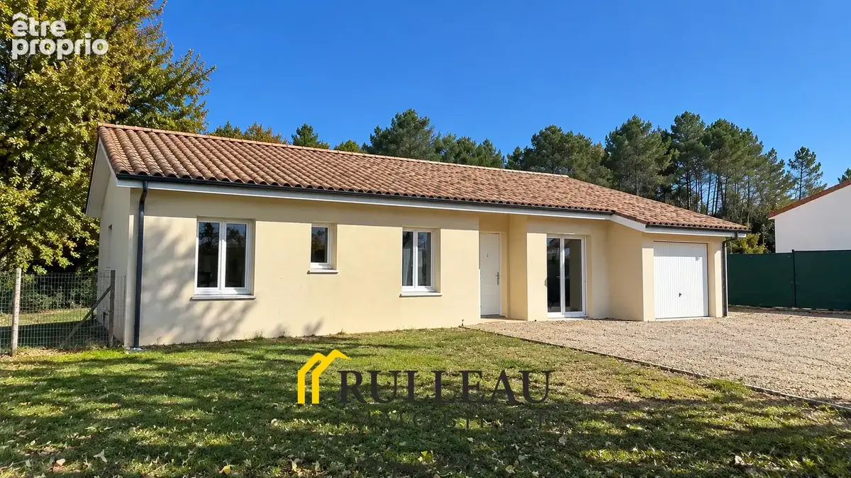 Maison de plain-pied de 108 m2 avec garage, terrain de 1 001 m2 et DPE A à Laruscade - photo 1