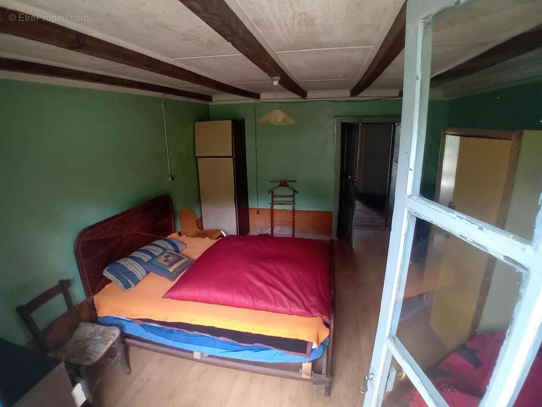 Chambre coté jardin  - Maison à SAINT-PIERRE-LAFEUILLE