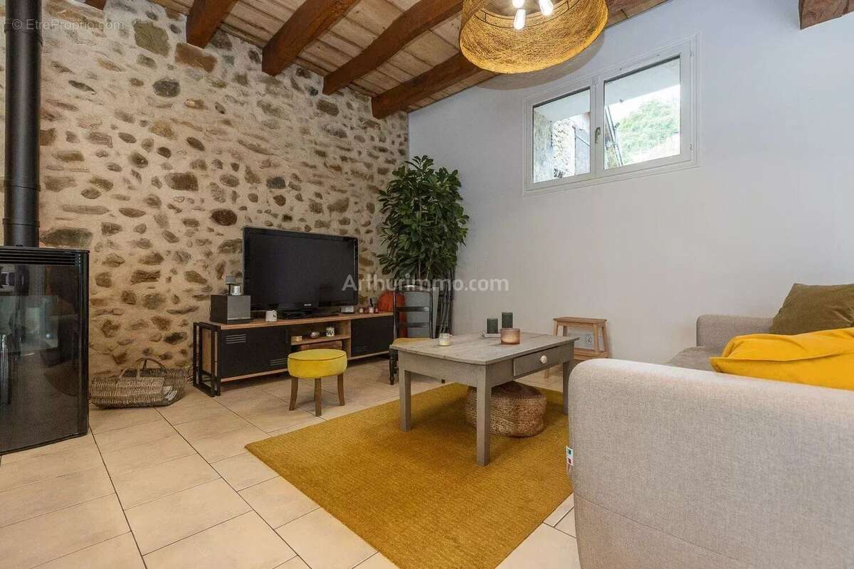 Maison à PEYRIEU
