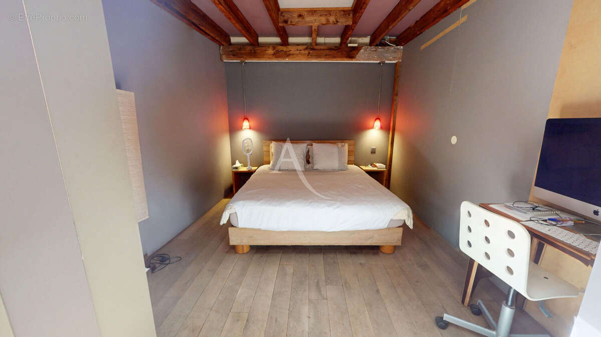 Un loft caché au coeur de neuilly-sur-marne, une propriété hors normes aux volumes exceptionnels - photo 4