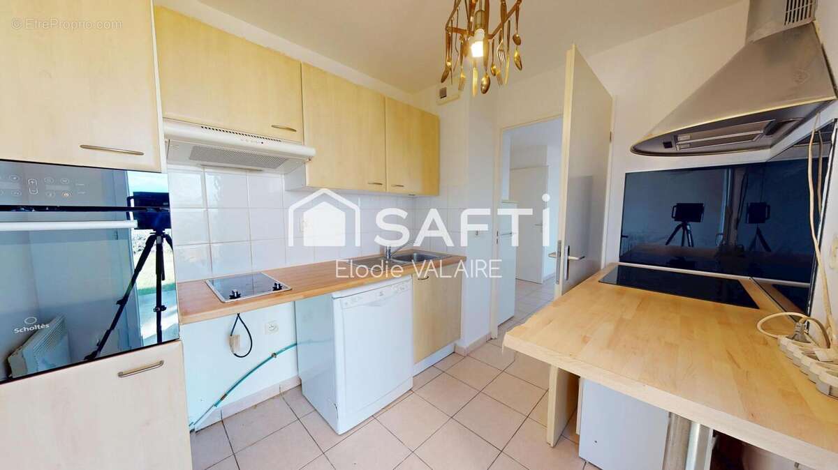 Photo 2 - Appartement à L'ISLE-D'ABEAU