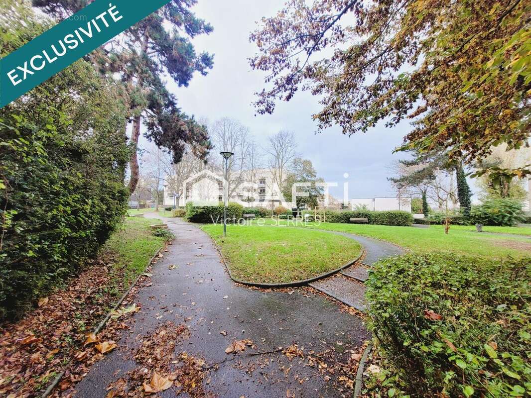 Photo 2 - Appartement à HEROUVILLE-SAINT-CLAIR