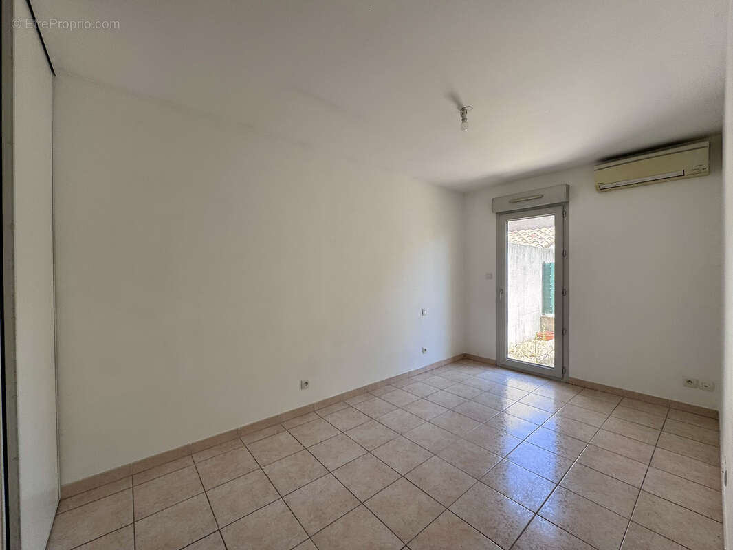 Appartement récent en rez-de-jardin - photo 5