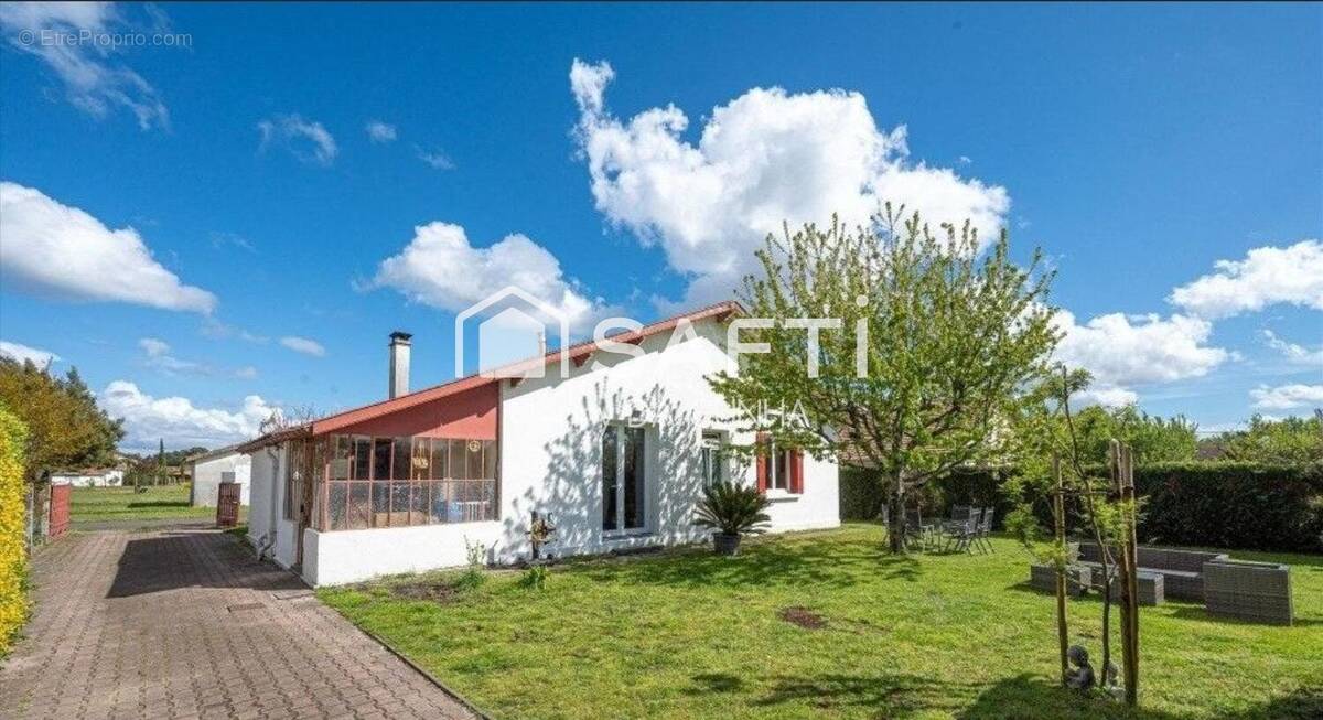 Photo 1 - Maison à LABOUHEYRE