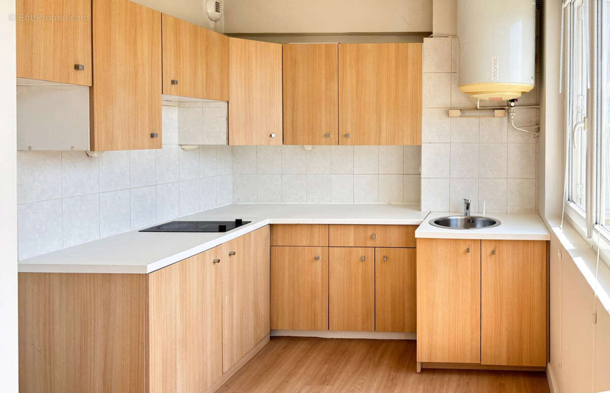 Appartement à vendre 2 pièces FRANCHEVILLE (69) - photo 2
