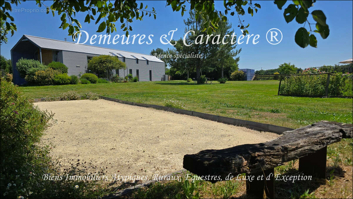 Remarquable maison d'architecte sur 3000m2 avec piscine, terrasse, boulodrome, au Sud de NANTES - photo 5