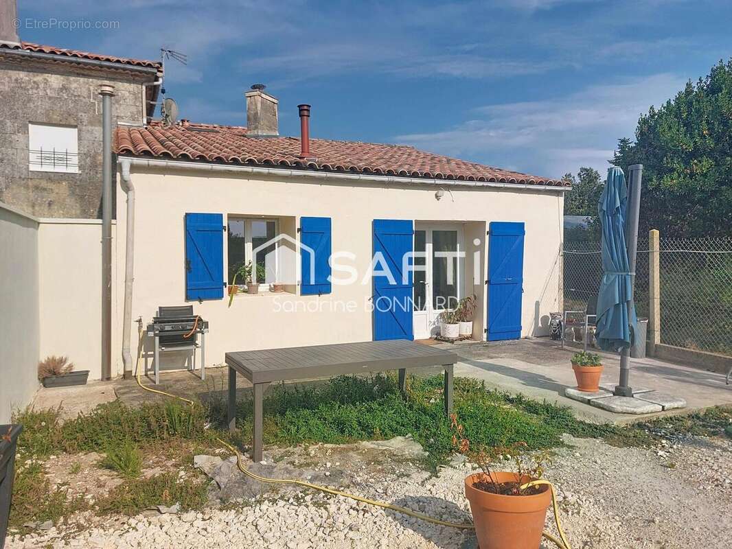Maison 86 m² à Barzan  - photo 7
